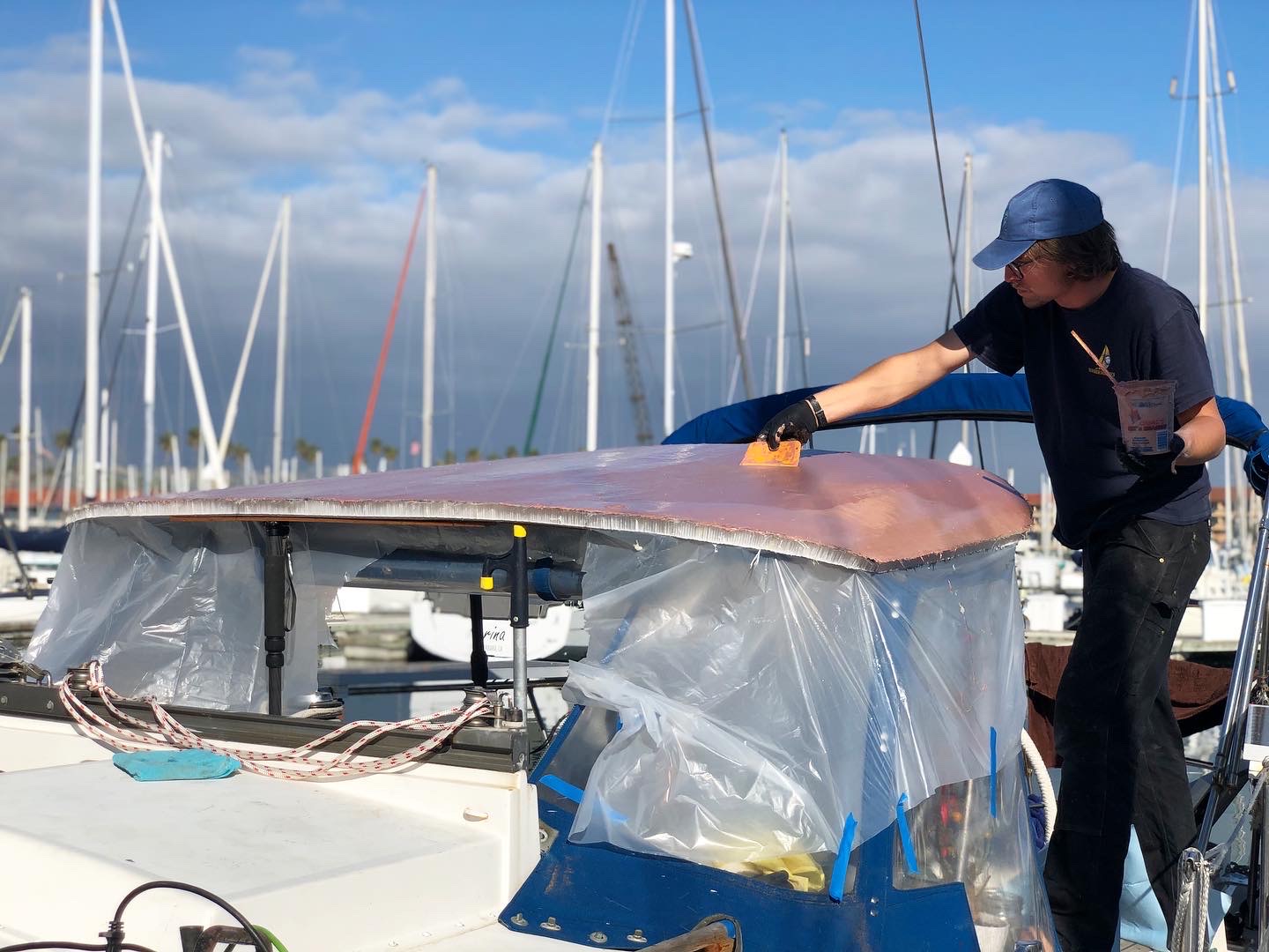Chris working on our hard top sailboat dodger