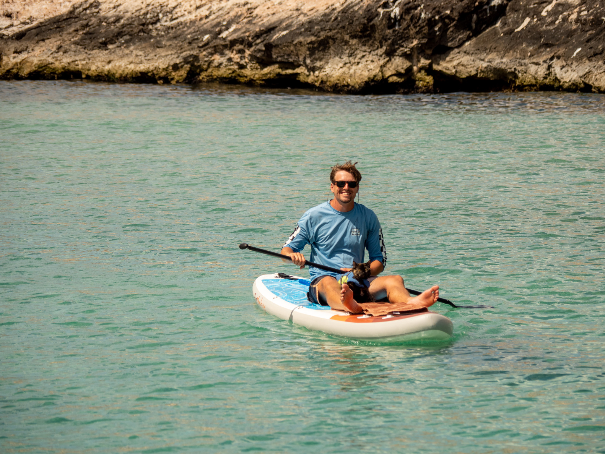 Paddle boarding with a cat